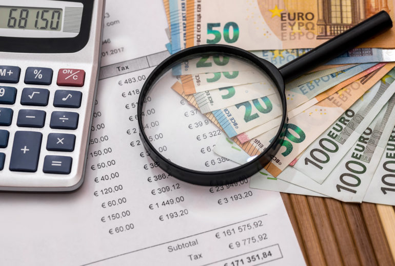 Purchase order with euro, magnifier and calculator